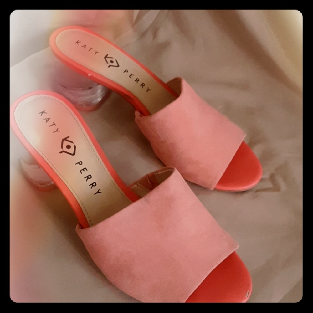Katy Perry peach suede slides with glass heel.